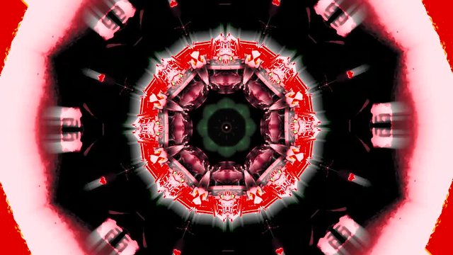 Video de caleidoscopio con formas geom&eacute;tricas que se abren con diferentes movimientos y tonos rojos, rosa, negro y blanco
