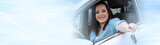 Young woman showing new car keys. panoramic banner