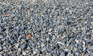 Gravel stones texture background with shallow depth of field