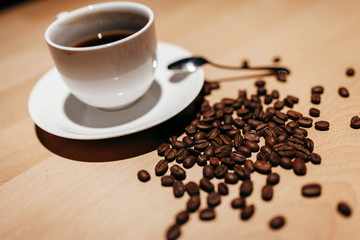 Coffee cup and coffee beans