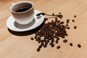 Coffee cup and coffee beans