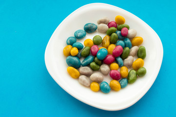 colorful dragee in the plate