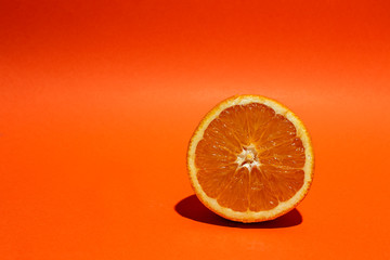 Fresh Oranges on orange background