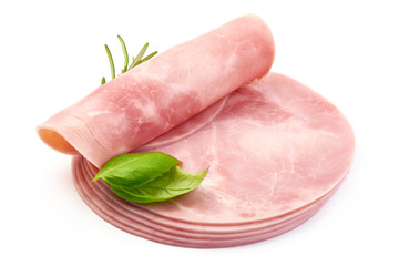 Sliced Boiled Ham with basil, close-up, isolated on a white background