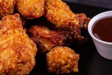 A chicken wing in breadcrumbs