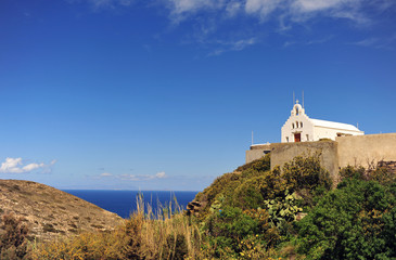 Fototapeta na wymiar Beautiful white chapel at the sea