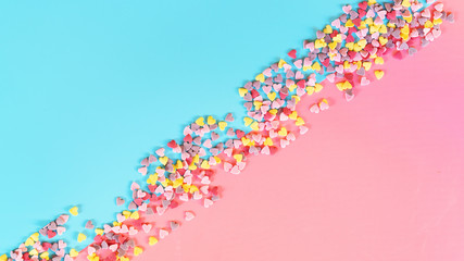 Candy frame  background.  Copy space concept . Flat lay, top view. Candies on pastel turquoise background.