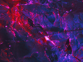 Abstract background. Mysterious stranger wall. Lava surface. Holographic purple neon colors. Rock...