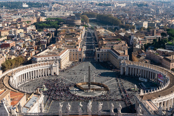 Fototapeta na wymiar Famous Saint Peter's Square in Vatican, aerial view of the city. Rome, Italy