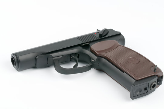 Automatic gun pistol on dark background