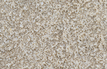 Flat sand surface textured background. Close up of sand