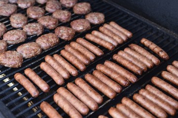 breakfast sausage cooking in smoker