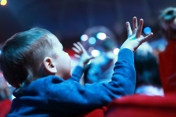 Child in concert hall