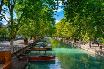 Fototapeta na wymiar ANNECY, France - September 7 2018: Canal du Vasse as seen from Pont des Amours inland. Located in the Auvergne-Rhône-Alpes region in southeastern France, Annecy is often called the Venice of the Alps