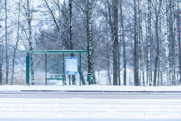 Bus stop with forest and heavy snow background at Helsinki, Finland.