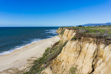 Eroded cliffs and sandy beach, Pacific Ocean, Half Moon Bay, California