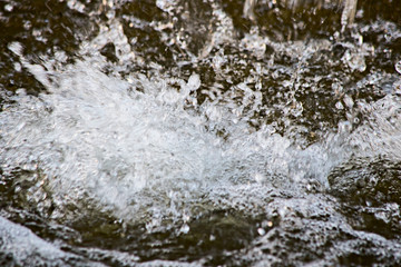 Abstract background with splashing water with foam