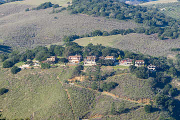 Houses perched on a steep hill, Monterey Peninsula, California