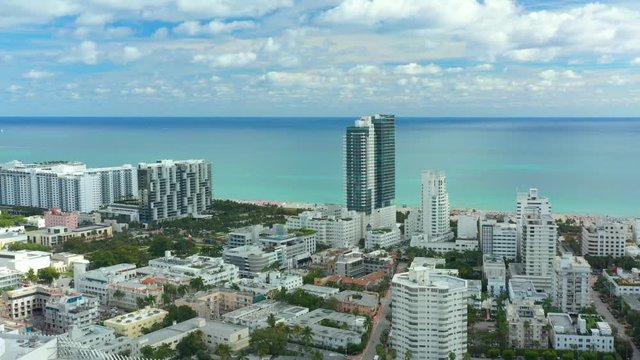 Aerial footage of a beach scene in Miami