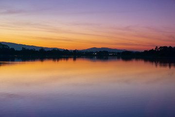 Fototapeta na wymiar After sunset glow reflected on a lake surface, Mountain View, San Francisco bay area, California