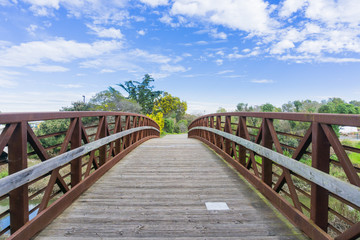 Fototapeta na wymiar Bridge in Shoreline Park, Mountain View, Silicon Valley, south San Francisco bay, California