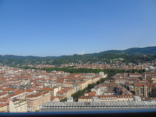 Obraz premium Turin, Italy - 12/01/2018: An amazing photography of the city of Turin from italy in summer days from the high and low part of the city including the beautiful river of Po from the center
