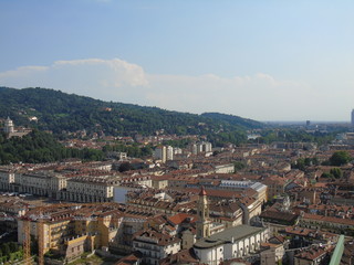 Fototapeta premium Turin, Italy - 12/01/2018: An amazing photography of the city of Turin from italy in summer days from the high and low part of the city including the beautiful river of Po from the center