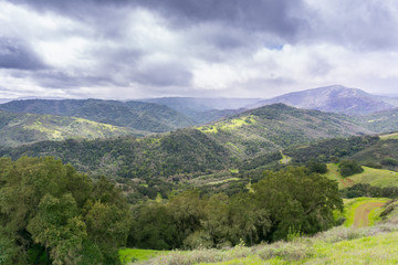 View towards Santa Cruz mountains from Calero Reservoir County Park on a stormy day, California