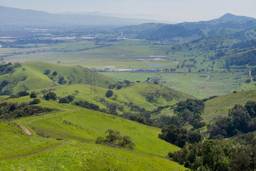 Fototapeta premium View over the valley south of San Jose from Santa Teresa park, Santa Clara county, California