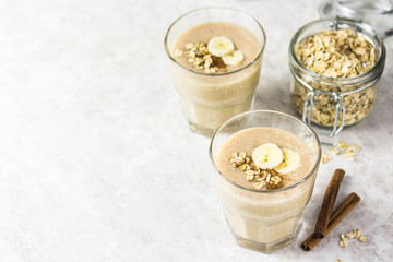 Peanut butter oatmeal breakfast smoothie. Selective focus, space for text.