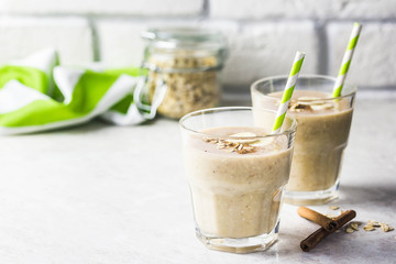 Peanut butter oatmeal breakfast smoothie. Selective focus, space for text.