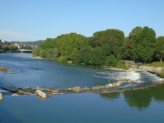Turin, Italy - 12/01/2018: An amazing photography of the city of Turin from italy in summer days from the high and low part of the city including the beautiful river of Po from the center