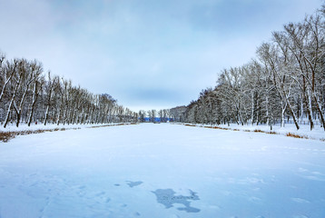 Snow covered winter lake landscape.