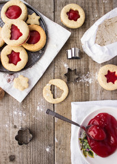homemade linzer cookies heart-shaped and decorations on wooden table free space for text - holidays, winter, celebration, Valentine's day concept