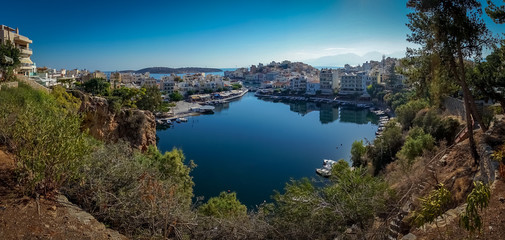 Fototapeta na wymiar Agios Nikolaos, Crete - 10 01 2018: The city of Agios Nikolaos. View at the top of the lake