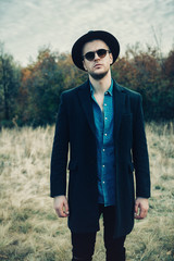 fashionable guy with glasses