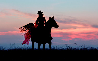 Obraz na płótnie Canvas Lady in English dress with mantle, tall hat riding horse on sunset background. Fantasy equestrian female rider in English style on landscape.