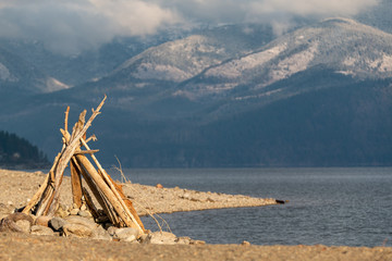 Log Tepee on a Beach © Benjamen McLachlan