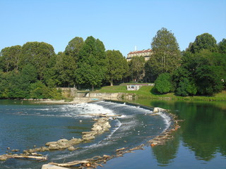 Turin, Italy - 12/01/2018: An amazing photography of the city of Turin from italy in summer days from the high and low part of the city including the beautiful river of Po from the center