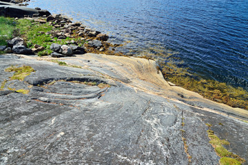 Beautiful rocky shore of the White sea. Bay Chupa, Karelia, Russia
