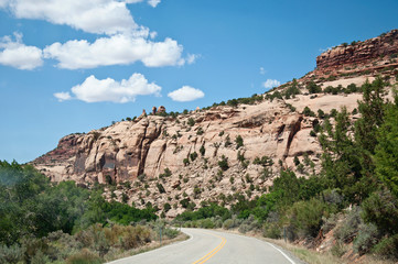 Curve in front of a bright hills in American desert