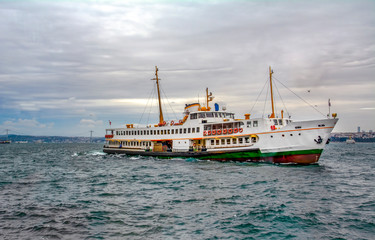Obraz premium Beautiful View touristic landmarks from sea voyage on Bosphorus. turkish steamboats, view on Golden Horn.