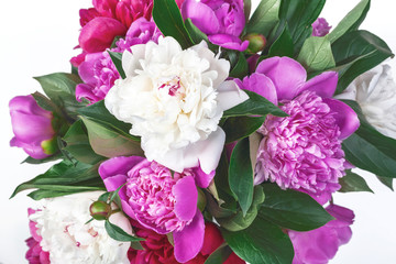 Bouquet of pink and white peonies isolated on white background. Top view.