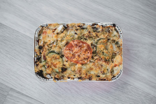 vegetables and meat together baked in box to take away