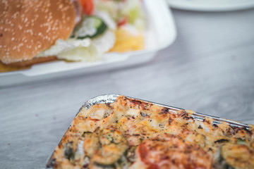 vegetables and meat together baked in box to take away