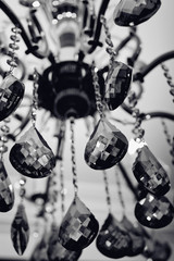 vintage classic chandelier. Chrystal chandelier close-up in the dark. Glamour background