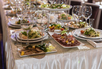 Serving dishes in the restaurant. luxury dinner served on the table