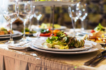 Serving dishes in the restaurant. luxury dinner served on the table