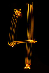 number 4, made of red tracer. burning numbers.