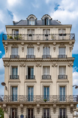 Paris, narrow building, typical parisian facade place de la Nation